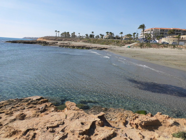 Cala Mosca Blickrichtung Strandpromenade